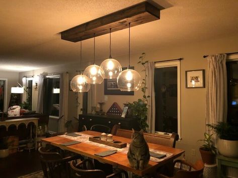 A friend saw my rustic kitchen light fixture and asked if I could adapt it to use these large Ikea globes she just had to have. I said YES! Here's the process. How To Make A Light Fixture, Kitchen Table Light Fixtures, Lamp For Dining Table, Dining Table Lights, Porch Lanterns, Diy Industrial Lighting, Globe Light Fixture, Rustic Kitchen Lighting, Diy Luminaire