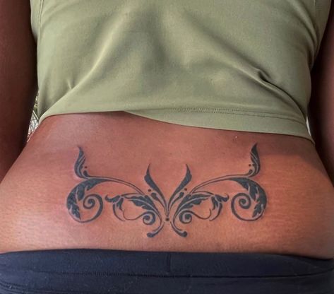 by @nas.dynasty Lower Back Flower Tattoo, Floral Ornamental Tattoo, Shhh Tattoo, Lower Back Tats, Arabic Tattoo Design, Dark Skin Tattoo, Garter Tattoo, Funky Tattoos, Tattoos For Black Skin