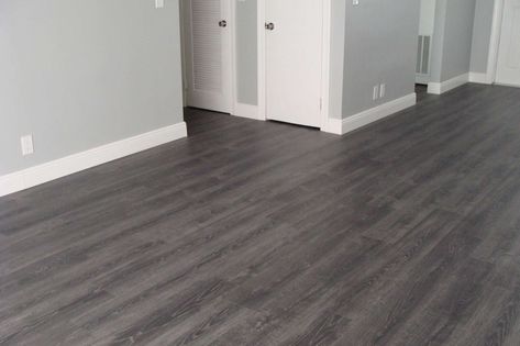 7+ Awesome Dark Grey Wood Floors Collection -  -  #darkgrayhardwoodfloors #darkgraywoodfloors #darkgreyhardwoodfloors #darkgreyhardwoodfloorskitchen #darkgreypaintedwoodfloors #darkgreystainedwoodfloors #darkgreywallslightwoodfloors #darkgreywoodfloors #darkgreywoodfloorswithwhitecabinets #darkgreywoodtilefloors Check more at https://woodplans101.com/7-awesome-dark-grey-wood-floors-collection/ Grey Wood Floors Bedroom, Light Grey Wood Floors, Grey Wooden Floor, Bedroom Wood Floor, Grey Hardwood Floors, Grey Laminate Flooring, Diy Wood Floors, Grey Hardwood, Living Room Wood Floor