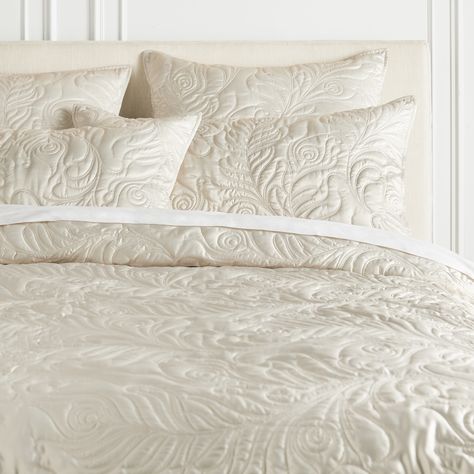 The Peacock Bedding Collection in Champagne makes a stunning addition to your bedroom. Dress your bed in 100% polyester charmeuse that features machine quilting with exquisite Peacock feather design. Mix and match with other champagne bedding collections for a modern, layered look. Z Gallerie exclusive.Details and Dimensions Face/Back/Binding: 100% Polyester Charmeuse; 150 gsm poly fill, machine quilting Standard and King Shams - Envelop closure Euro Sham - Zipper closure Champagne ImportedOther Bed Spreads Luxe, Bed Quilts Modern, Champagne Bedroom Decor, Glam Bedding, Tuscan Bedroom, Peacock Bedding, Embroidered Sheets, Sage Bedroom, Bed Inspiration