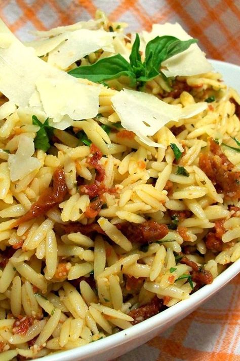 Sun-Dried Tomato Basil Orzo | "Super yummy. We ate every last bite of it and plan on making it again very soon." #sidedishrecipes #sides #dinnersidedish #sidedishes #sidedishideas Sun Dried Tomato Orzo Salad, Orzo Recipes Sun Dried Tomatoes, Orzo Sun Dried Tomato Recipes, Sun Dried Tomato Orzo, Tomato Basil Orzo, Italian Fest, Orzo Recipes Side, Risoni Salad, Basil Orzo