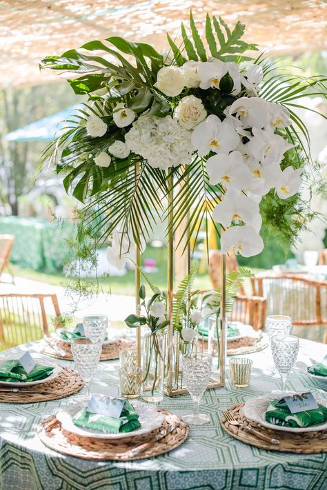 Tropical Wedding Centerpieces Palms, Tropical Wedding Centrepiece, Tropical Glam Wedding Flowers, Orchid And Palm Centerpiece, Roses And Palm Leaves, Tropical Ballroom Wedding, White Flowers With Palm Leaves, Wedding Tropical Decorations, Black And Gold Tropical Wedding