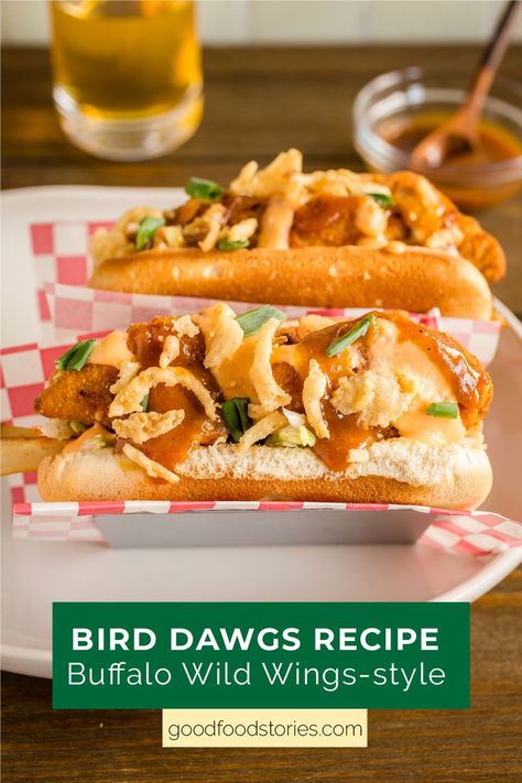 two Bird Dawgs topped with cheese and BBQ sauce in a taco holder Tofu Cream Cheese, Beer Cheese Recipe, Cauliflower Steaks Recipes, Wings Bird, Mustard Bbq Sauce, Spicy Wings, Honey Bbq Sauce, Slow Cooker Stew, Spicy Brown Mustard