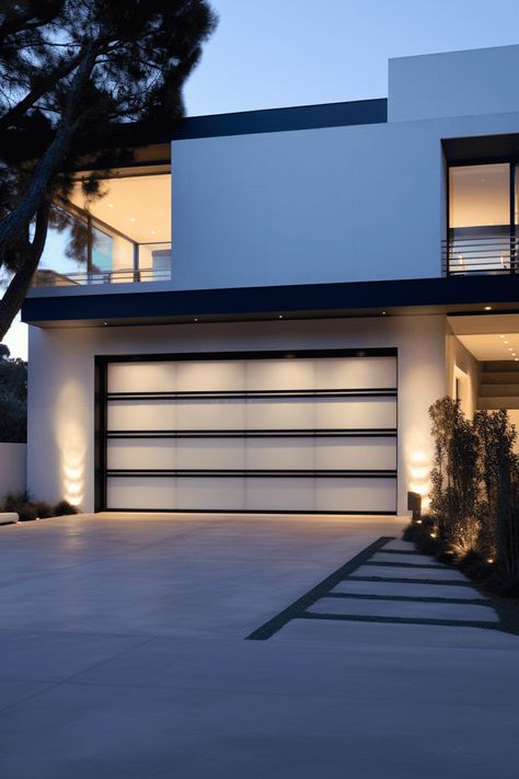 Exterior Garage Ideas: Modern and Discreet Door Design Modern Coastal Garage Door, Classic Garage Design, Glass Door Garage, Modern Aluminium Garage Doors, Modern Garage Lights Exterior, Modern Garage Doors With Windows, Exterior Garage Ideas, Garage Design Exterior, Garage Exterior Ideas