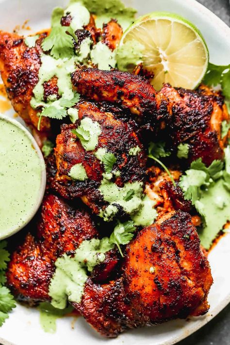 So easy, but loaded with fresh and vibrant flavors, this Peruvian chicken is one delicious dinner. Marinated with lime, spices and herbs. Peruvian Chicken With Green Sauce, Chicken With Green Sauce, Peruvian Chicken Recipe, Honey Mustard Chicken Thighs, Peruvian Chicken, Peruvian Dishes, Marinated Chicken Thighs, American Foods, Peruvian Food