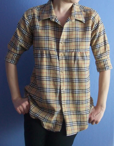 Turn a men's shirt into a tunic.  Pull up the sleeves, make a gathered front, keep all original collars, cuffs, and buttons.  This one's a Burberry shirt. Recycled Mens Shirt, Upcycling Shirts, Umgestaltete Shirts, Shirt Makeover, Mens Shirt Refashion, Diy Clothes Refashion, Shirt Inspiration, Burberry Shirt, Sewing Alterations