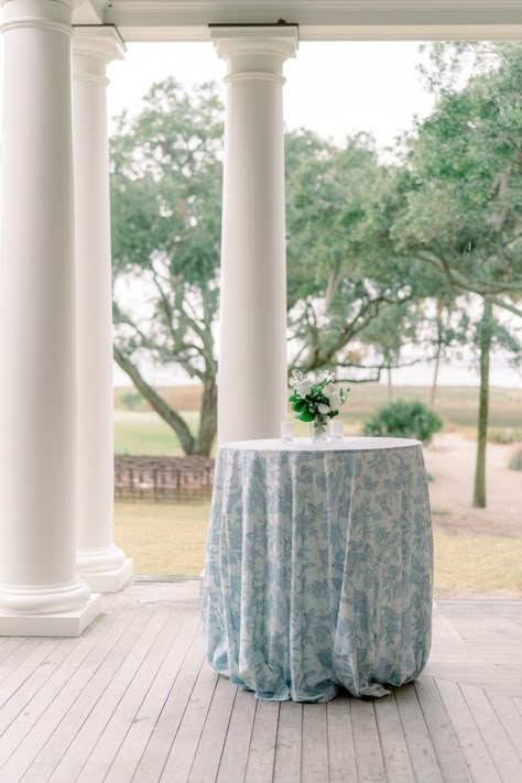 Cocktail high table with white and blue floral table cloth. Blue And White Cocktail Table, Wedding Cocktail Tables, Floral Table Cloth, Destination Wedding Ceremony, Cocktail Hour Decor, White Cocktail Tables, Cocktail Cake, Blue Cafe, White Cocktails