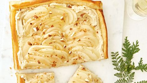 Sweet ripe pears and creamy mascarpone pair up in our Pear & Almond-Mascarpone Tart for a decadent way to welcome 2023. Recipes Using Puff Pastry, Canadian Living Recipes, Mascarpone Tart, Welcome 2023, Pear Almond, Mascarpone Recipes, Ripe Pears, Dessert Squares, Puff Pastry Crust