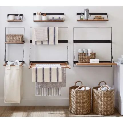 The 10 Best Sources for Wall Mounted Shelving | Apartment Therapy Fold Out Table, Desks For Small Spaces, Drying Rack Laundry, Folding Laundry, Laundry Room Remodel, Laundry Drying, Laundry Closet, Organization Essentials, Room Remodel