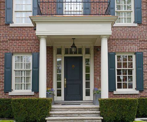 Red brick house dark blue door Red Brick Colonial, Brick House Front Door Colors, Red Brick House Exterior, House Brick, Portico Design, Brick Colonial, Georgian Colonial, Colonial House Exteriors, Shutter Colors