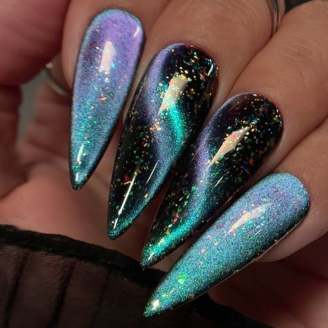 Witch Nails Stilleto, Purple Bat Nails, Pink Cat Eyes Nail, Chrome Magnetic Nails, Holo Cat Eye Nails, Blue Sparkles Nails, Fall Cat Eye Nails 2024, Galaxy Cat Eye Nails, Hot Pink Black Nails