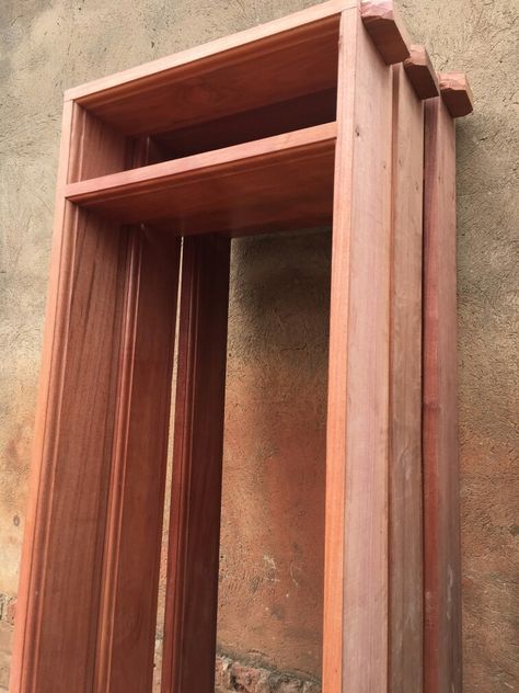 Mahogany door frames with vents 10*2. 0701626921 #mahoganydoorframes #mahoganydoorframesug #mahoganydoorframesuganda #woodendoorframes Door Frame Design Wooden, Mahogany Wood Furniture, Panel Door Design, Mahogany Door, Wooden Dining Table Designs, Site Work, Flush Door Design, Single Door Design, House Main Door Design