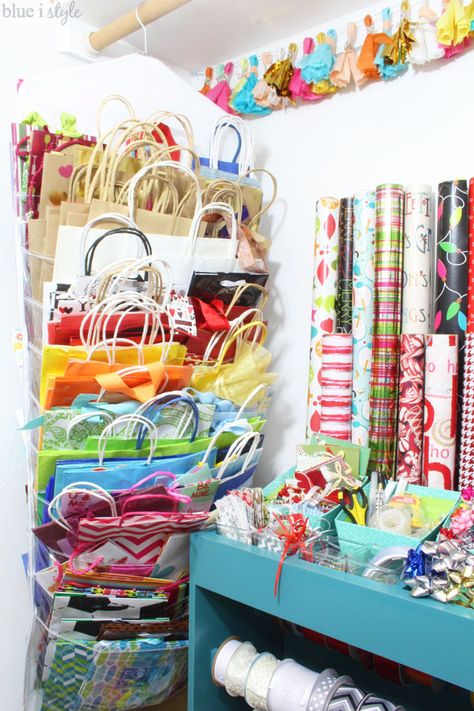 Take advantage of that under-utilized space in your guest room closet to organize all of your gift wrap supplies - from wrapping paper and gift bags, to ribbon and gift tags, and even greeting cards and stationery...tips to organize it all! Wrapping Supplies Storage, Gift Bags Organizer Storage Ideas, Gift Wrap And Bag Storage, Gift Bag Organizer Storage Ideas, Organizing Gift Bags And Tissue Paper, How To Organize Gift Bags And Tissue Paper, Organization Ideas For Gift Bags, Gift Bag And Tissue Paper Organization, Gift Tag Storage