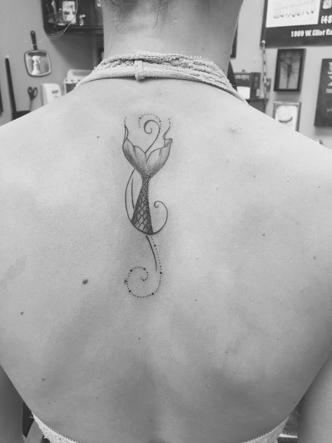 mermaid tail tattoo Mermaid Tail Tattoo, Mermaid Tattoo Meaning, Tail Tattoo, Back Tattoos Spine, Tattoo Mermaid, Lower Back Tattoo Designs, Tattoo 2023, Tattoo Tiny, Super Tattoo