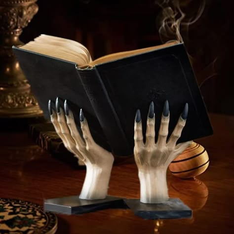 PRICES MAY VARY. Witchy Hand Book Stand: Books falling over on the shelf? Nevermore! Keep your treasured classic stories and novels in great shape with these clever witch hand bookends. Material: Decorative Bookends are made of environmentally friendly resin that is durable and long lasting; and could hold large and heavy books well. Perfect Size: Fit for any space, the hand bookends are perfect for bookcases and desktops of any size. This is a unique and sophisticated piece of home decor. Non-S Monster Hands, Scary Monster, Witch Hands, Halloween Room Decor, Witchy Home Decor, Decorative Bookends, Scary Monsters, Goth Decor, Book Stand