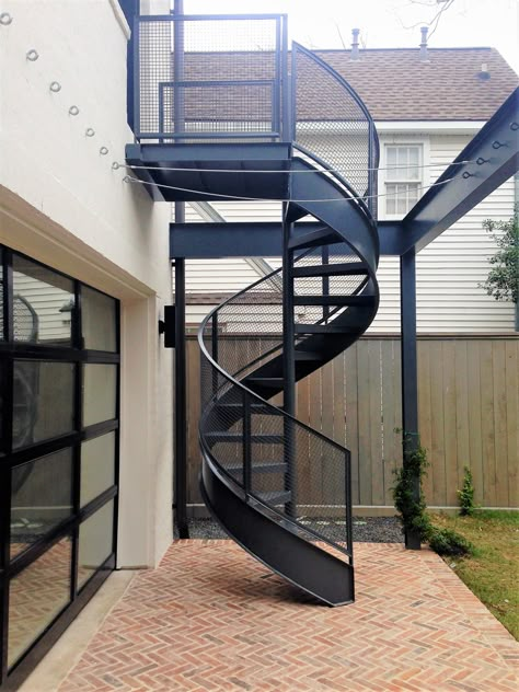 This is an all steel, code compliant spiral stair. Has a flat bar handrail with flat bar post, with a stringer and a mesh rail system. Get your free quote today! www.stairwaysinc.com Steel Spiral Staircase Outdoor, Diy Spiral Staircase, Outside Stairs Design, Mesh Railing, Metal Spiral Staircase, Spiral Staircase Outdoor, Spiral Staircase Kits, Staircase Manufacturers, Spiral Stairs Design