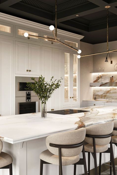 A light and airy kitchen concept with a detailed central island featuring a double bullnose edge worktop in Calacatta Borghini. Our hand-painted Iconic collection cabinetry has fluted glass fronts and aged brass fittings to compliment the gold marble veining. #Smallbone #KitchenDesign #KitchenInspiration #DreamKitchen #Marble #Homedecor #TimelessDesign #WhiteKitchen #HomeInspo #Kitchenisland #DesignDetails #LuxuryLiving #KitchenGoals #cabinetry #KitchenRenovation #LuxuryKitchen #Handcrafted Quartzite Countertops Taj Mahal, Light And Airy Kitchen, Smallbone Kitchens, Calacatta Borghini, Airy Kitchen, Kitchen Concept, Bath Trends, Fluted Glass, New House - Kitchen