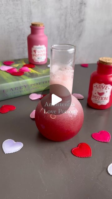 Danica Frye l cocktails + mocktails on Instagram: "It’s time for part 3 of our Harry Potter cocktail series! With Valentine’s Day around the corner, I had to bring the Amortentia potion to life for Mocktail Monday! Slughorn says it’s the most powerful love potion in the world, so keep an eye on your goblets this week! ❤️ Comment “glass” and I’ll DM you a link to everything I used in this video 🧪 To a cocktail shaker, add: 4 oz pomegranate juice 2 oz n/a tequila 1/4 tsp rose water 1/2 oz lemon juice 1/2 oz simple syrup Top with sparkling water, and enjoy! #harrypotter #hogwarts #love #cocktails #mocktails #tequila #valentinesday #galentinesday #lovepotion #drinks #drinkrecipes" Love Potion Cocktail, Harry Potter Cocktails, Love Potion, Pomegranate Juice, Sparkling Water, Cocktail Shaker, Simple Syrup, Rose Water, Mocktails