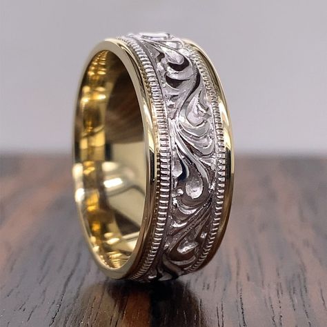 "This vintage band is crafted entirely of 14k gold, with yellow gold framing the edge of the ring, and white gold creating a floral accented center. The center of this ring is slightly domed, giving it the ability to catch the light and accented by the waving, faceted edge. Metal: 14K Yellow and White Gold Width of Band: 6.5 mm Height off Finger: 2.1 mm Ring Size: 12.25 Marks: \"14KT\" Stamped on the inside band SKU #: 2XXPDMEM Each piece has been identified and graded by a Graduate Gemologist w Mixed Metal Mens Wedding Bands, Floral Design Wedding, Wedding Band Designs, White Gold Wedding Bands, Vine Design, Vintage Band, Design Wedding, Men's Rings, Mens Wedding Bands