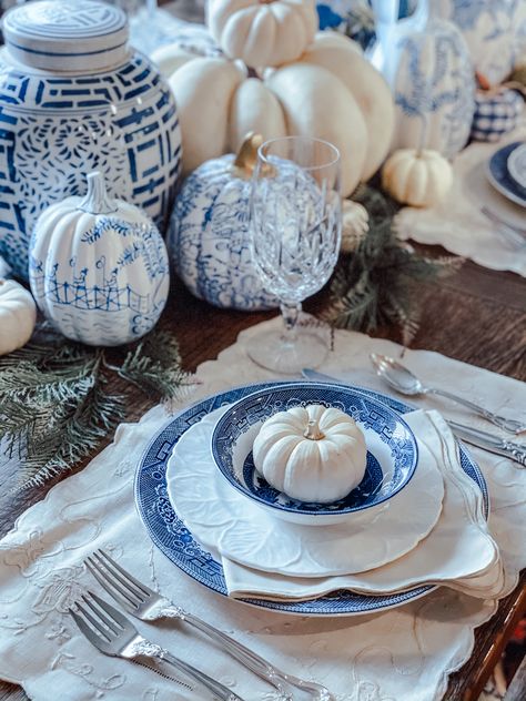 Read my blog post for tips on how to easily style your Thanksgiving table without breaking the bank! Table Setting Blue & White chinoiserie pumpkins preppy traditional home decor tablescape pagoda blue gingham turkey plates china silver crystal fancy white pumpkins blue pumpkins scalloped napkins scalloped placemats blog place setting blue willow china spode antique grandmillennial granny chic White And Blue Thanksgiving Table, Grandmillenial Table Setting, Blue And White Thanksgiving Tablescape, Grandmillenial Fall, Blue And White Thanksgiving Table, Blue Thanksgiving Table Decor, Blue Willow Tablescapes, Blue Home Aesthetic, White Thanksgiving Table