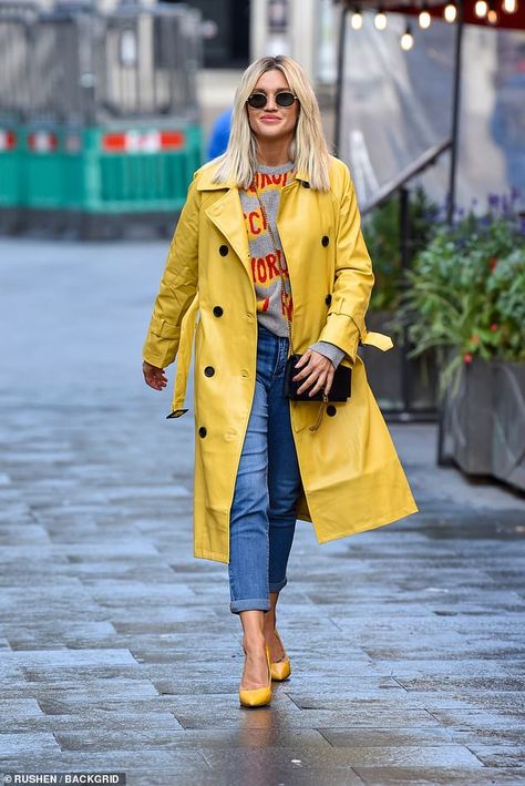 On her way! Ashley Roberts teamed a yellow belted faux leather trench coat with a Fiorucci... Yellow Rain Coat Aesthetic, Colorful Trench Coat, Yellow Trench Coat Outfit, Yellow Raincoat Outfit, Yellow Coat Outfit, Gold Shoes Outfit, Yellow Jacket Outfit, Trench Coat Outfit Winter, Yellow Trench Coat