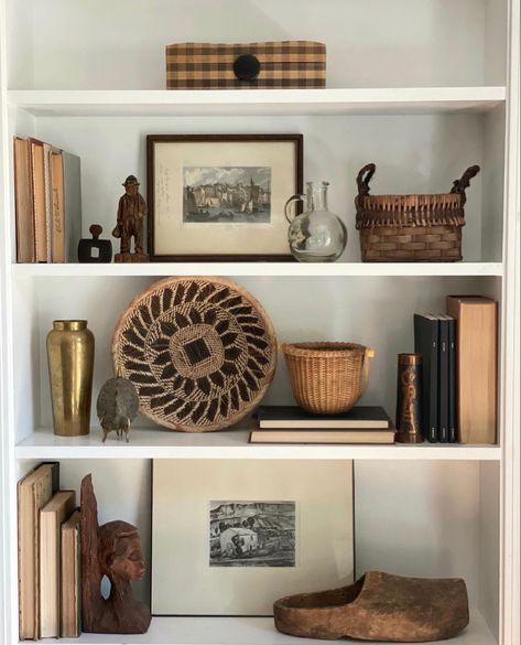 Masculine Bookshelf Styling, White Bookshelf Styling, Styled Shelves Living Room, Functional Shelf Styling, Masculine Bookshelf Decor, Deep Shelf Decor, Moody Shelf Decor, Styling Deep Shelves, Wooden Bookshelf Styling