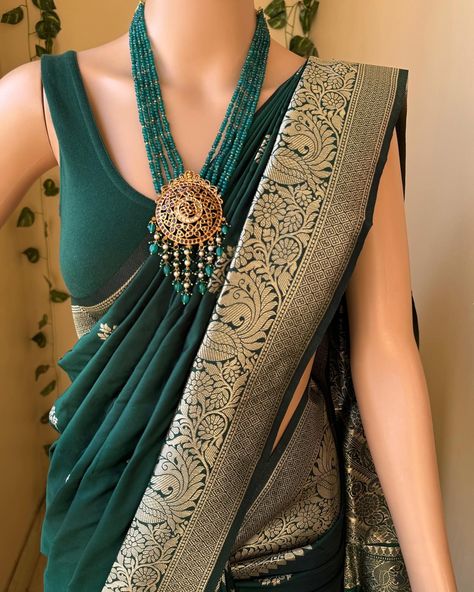 Www.Thejacouture.in > silk sarees > Bottle green Art silk saree. . Bottle green Art silk saree with silver gold zari design all over saree and border. Comes with bottle green blouse piece. Saree height: 48 inches. Saree length: 5.5 meters. Blouse: 80cm . Priced:1750/- INR Normal wash. . Neckpiece: @adornachennai . #sareelove #india #sareeday #sareestyle #sareelovers #sareedraping #sareeblousedesigns #sareenotsorry #sareelover #sareeaddict #artsilk #artsilksarees #bottlegreensaree Jewellery With Green Saree, Green Saree Jewellery Ideas, Dark Green Saree Look Traditional, Green Silk Saree, Luxury Green Bollywood Style Saree, Green Saree With Border, Bottle Green Blouse, Bottle Green Saree, Green Sari