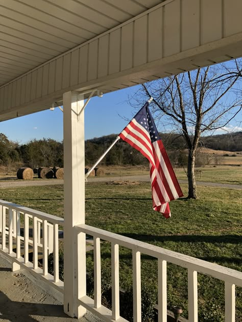 On my front porch American Flag Outside House, Front Porch Aesthetic, American Flag On Porch, American Flag On House, Flag On House, Flag On Porch, Honey Art, Usa House, Americana Aesthetic