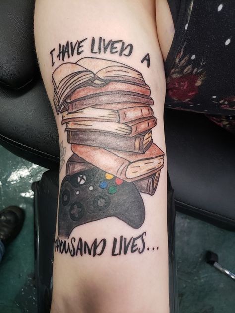 Gamer and librarian all day, every day tattoo Gamer Tattoos Small Simple, Pc Gamer Tattoo Ideas, Board Game Tattoo Ideas, Nerd Sleeve Tattoo, Nerdy Tattoos For Men, Small Forearm Tattoo Men Ideas Unique, Gamer Tattoos Men, Game Controller Tattoo, Tattoos For Gamers