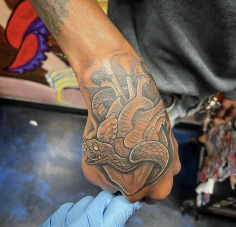 Best Hand Tattoos Men Unique, Spiritual Hand Tattoos For Guys, Hand Tattoos Black Man, Black Male Hand Tattoos, Money Hand Tattoo, Hood Arm Sleeve Tattoos, Black Men Hand Tattoos, Black Male Tattoos Forearm, Men Hand Tattoos Ideas