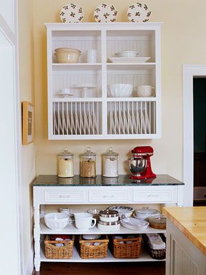 This refurbished table blends old and new with fresh white paint and a granite top. Two added shelves create optimal storage potential. #storage #diy #kitchen Baking Table, Refurbished Table, Smitten Kitchen, Plate Racks, Stylish Storage, A Kitchen, Open Shelving, Kitchen Inspirations, Kitchen Organization