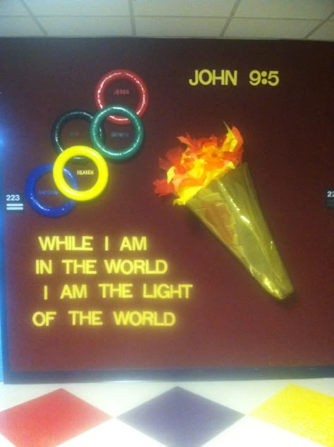 The Light of the World Bulletin Board Vbs Olympics Theme, Catholic Schools Week Bulletin Board, Olympic Bulletin Board, World Bulletin Board, Vbs Olympics, Sunday School Themes, Catholic Schools Week, Vacation Bible School Themes, Olympic Crafts