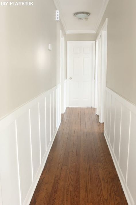 The Hallway Board and Batten Reveal | The DIY Playbook Flat Hallway Ideas, Hallway Board And Batten, Board And Batten Hallway, Wainscoting Hallway, White Hallway, Wainscoting Bathroom, Hallway Makeover, Wainscoting Styles, Diy Wainscoting