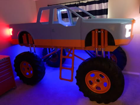 The monster truck bed that I made for my son has lots of built in lights and sound effects. Monster Truck Room Decor, Monster Truck Bed, Disney Kids Rooms, Truck Bed Lights, Monster Truck Room, Blaze Birthday Party, Truck Room, Monster Truck Theme, Cool Bedrooms For Boys