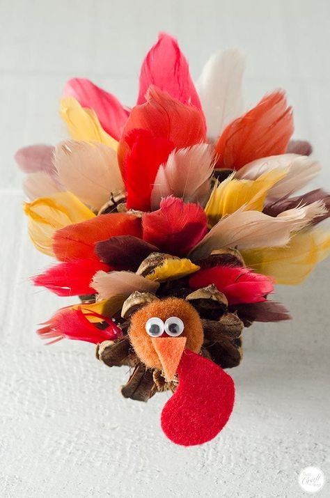 Make these adorable pinecone turkeys as the perfect Thanksgiving decoration using faux feathers and some glue. Great for kids and adults alike! Thanksgiving with Kids | Thanksgiving Ideas for Kids | Thanksgiving Crafts | Thanksgiving Cookies | Thanksgiving Decorations | Thanksgiving at School | DIY Thanksgiving | Thanksgiving Dinner #thanksgiving #thanksgivingideas Felt Thanksgiving Crafts, Autumn Craft Ideas For Adults, Pumpkin Turkeys, Diy Turkey Crafts, Thanksgiving With Kids, Pinecone Turkeys, Thanksgiving Ideas For Kids, Kids Thanksgiving Crafts, Easy Diy Thanksgiving Decorations