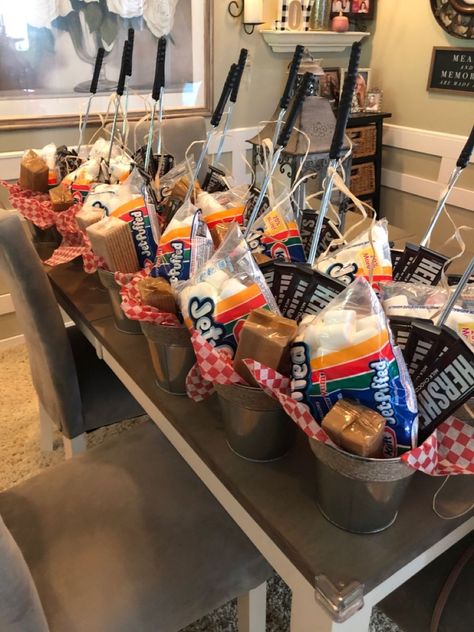 Road Trip Snack Basket Ideas, Guy Work Christmas Gifts, S’mores Basket Gift, Summer Themed Raffle Basket, Employee Summer Gift Ideas, Summer Prize Basket Ideas, Marketing Basket Ideas, Shopping Spree Gift Ideas, Campfire Gift Basket Ideas