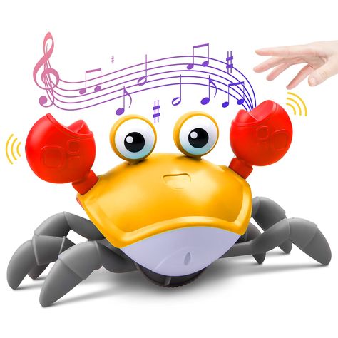 PRICES MAY VARY. Baby Musical Crawling Crab Toy: The smart walking crab toy will emit dynamic music when escaping, and the crab's eyes will flicker with lights at the same time which attracts babies attention and encourages babies to crawl and catch. They love listening to music and can't help waving their arms and legs following the music, it's a great toy for babies to exercise their muscles. Sensing Crawling Crab:When it encounters an obstacle while moving, it will move in the opposite direct Musical Toys For Kids, Interaktives Design, Crab Toy, Dancing Toys, Baby Musical Toys, Baby Montessori, Montessori Educational Toys, Dogs And Kids, Learning And Development