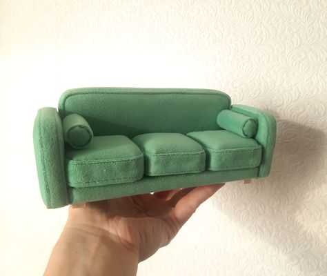 Miniature sofa complete with cushions 1/12th scale. Modern dollhouse furniture - miniature couch Make a gift to your dolls! Stunningly stylish and modern miniature sofa with cushions in 1/12 scale. Dolls will be happy! ***If you need this sofa in a different color, write to me. I will send you possible fabric colors. Approximate size: 1. Sofa length 21 cm (8.26 inches) width 7 cm (2.75 inches) height 7 cm (2.75 inches) 2. Square pillows 6*6cm(2.36*2.36inch) 3. Roller pillows 6.0*2cm Barbie Couch, Miniature Couch, Miniature Sofa, Modern Dollhouse Furniture, Sofa With Cushions, Square Pillows, Modern Dollhouse, Make A Gift, Mini House