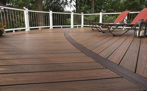 Give your deck a uniquely tropical look with #Trex Transcend decking in Spiced Rum. The deep, rich tones set the stage for hours of enjoyment. Get more inspiration from our #decking gallery at trex.com/inspiration/gallery/decks/ Small Backyard Deck, Trex Deck Colors, Decking Railing, Small Backyard Decks, Trex Composite Decking, Curved Deck, Backyard Deck Ideas, Trex Decking, Deck Inspiration