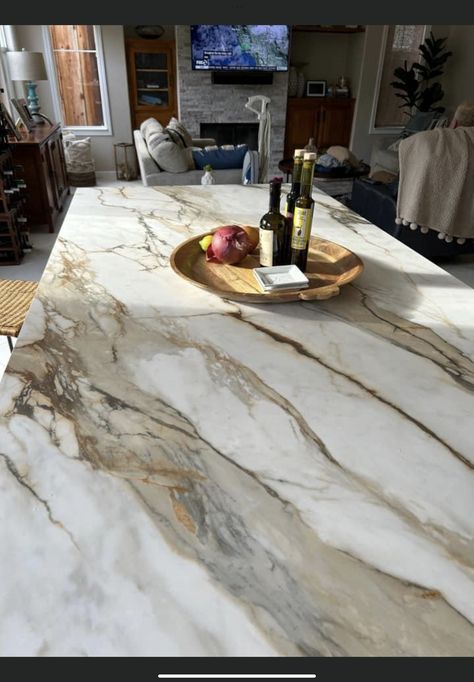 Sparkly Granite Countertops, Kitchen With Light Countertops, Heavy Vein Marble Kitchen, Calcutta Borghini Marble, 12 Ft Long Kitchen Island, Rustic Quartz Countertops, White Quartz Countertop With Brown Veins, Dramatic Quartz Countertops, Statement Countertops