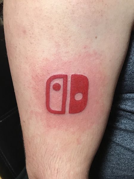 Is this the world's first Switch tattoo? Nintendo Switch Tattoo Ideas, Humanity Switch Tattoo, Wii Tattoo, Nintendo Logo Tattoo, Nintendo Switch Tattoo, Snes Controller Tattoo, Switch Tattoo, Nintendo Tattoo, Empty Canvas