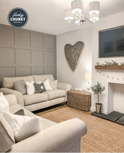 This image shows as gorgeous living room area, there is lots of wooden features which makes the room feel warm and cosy. But the overall theme of the room is grey, there is a feature wall to the back which has grey panelling. There is also a statement heart wall installation, which looks to be made from twigs and sprayed grey. Our solid wood mantel sits proudly above the fireplace area. Log Burner Living Room, Rooms Decoration, Living Room Panelling, Snug Room, Beige Living Rooms, Cosy Living, Living Room Decor Fireplace, Cottage Living Rooms, Cosy Living Room