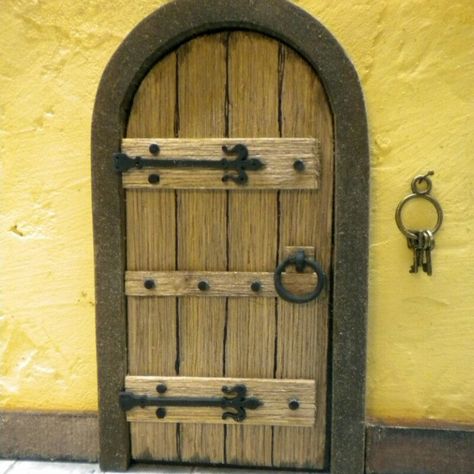 Browse unique items from FirecraftMiniatures on Etsy, a global marketplace of handmade, vintage and creative goods. Miniature Doors, Medieval Cottage, Medieval Door, Warhammer Quest, Castle Doors, Fairy Garden Doors, Medieval Decor, Fairy Castle, Black Door Handles