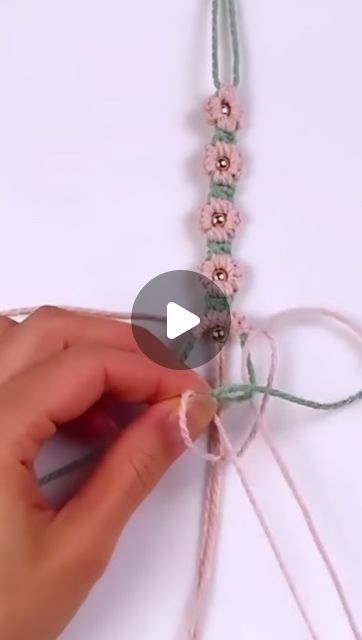 Thousands of Tips on Instagram: "Hey, crafters! Create a stunning daisy bracelet vu following these steps!  This DIY tutorial will guide you through making a charming daisy pattern using colorful threads and beads. It’s a perfect project for beginners and experienced crafters alike. You’ll learn how to weave the petals and add the bead center for a realistic look. Let’s get creative and make a beautiful piece of jewelry together! Credits:@bochiknot  #DIYBracelet #DaisyBracelet #ThreadArt #Beading #JewelryMaking #HandmadeJewelry #MakersGonnaMake #CraftTok #ForYou #JewelryMakingFun #FashionAccessory #SummerStyle #AnkleBraceletLove #BeadedBracelet #ArmPartyGoals #ThreadArt #DIYFashion #JewelryLover #HandmadeWithLove #CreativeExpression #GetCrafty #MindfulMaking #Craftastic #JewelryDesign #Tre Diy Bracelets Tutorials Step By Step, Charm Bracelet Tutorial, Colorful Threads, How To Weave, Daisy Bracelet, Thread Art, Arm Party, Daisy Pattern, Bracelet Tutorial