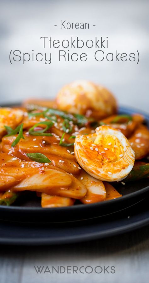 Korean Tteokbokki - These spicy rice cakes are a dinner treat to warm up the whole house! Chilli flakes and gochujang are the secret to this fiery morsel. | wandercooks.com Rice Cake Stir Fry, Tteokbokki Recipe Easy, Korean Spicy Rice Cake, Korean Tteokbokki, Stir Fry Spices, Spicy Rice Cake, Tteokbokki Recipe, Spicy Rice, Baked Rice