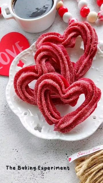 Jean Yap on Instagram: "Red velvet baked churros - less messy than frying 😅 Also tinted the cinnamon sugar using red glitter (I think I first saw this technique when @loveisbakeable tried it) #bakedchurros #bakednotfried #churros #redvelvet #valentinesdaydessert #valentinesdaytreats #redvelvetchurros #buzzfeedtasty #foodfluffer" Red Velvet Churros Recipe, Desserts Red Velvet, Pink Churros, Red Velvet Churros, Christmas Churros, Red Velvet Food, Red Pastries Aesthetic, Churro Photography, Red Foods For Color Party