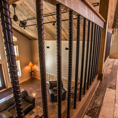 Custom finishings like this attractive rebar railing is what help turn each of our projects into a unique Legacy. #buildyourlegacy Loft Handrail Ideas, Rebar Railing, Banister Remodel, Loft Railing, Rustic Staircase, Rustic Stairs, Railing Ideas, Wood Railing, Metal Railings