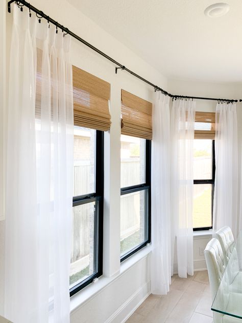 Drapes Over Roman Shades, Modern Farmhouse Shades, Curtains In Dining Room Farmhouse, Curtains For Living Room Windows Modern, Modern Farmhouse Curtains Living Rooms Long, Large Window Ideas Living Room, Roman Shades Sunroom, Dining Room With A Lot Of Windows, Bamboo Blinds With Curtains Kitchen