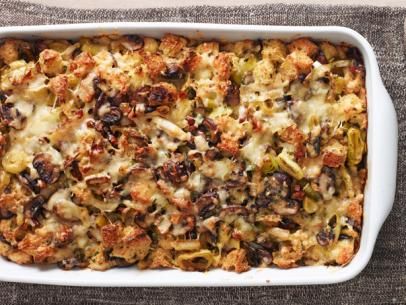 Mushroom and Leek Bread Pudding Recipe | Ina Garten | Food Network Mushroom And Leek Bread Pudding, Leek Bread Pudding, Leek Bread, Mushroom Bread Pudding, Artichoke Bread, Thanksgiving Vegetables Side Dishes, Thanksgiving Vegetable Sides, Carrot Casserole, Mushroom Leek