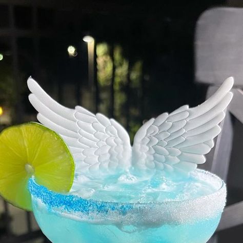 @lou_the_bartender on Instagram: "Angel Tears 💧
2.5oz mezcal 
3/4oz lime juice 
3/4oz coconut cream 
1/4oz blue curaçao 
( rim with light blue and regular sugar )
( decorate with little angels )
#cocktail #cocktails #cocktailrecipes #drinks #partydrinks #bartender #bartenders #mixology #mixologist #mezcal" Angel Tears, Blue Curacao, Party Drinks, Coconut Cream, Mixology, Lime Juice, Cocktail Recipes, Juice, Coconut